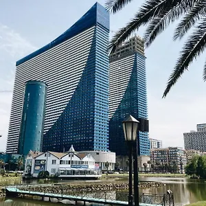 Orbi City Апартаменты